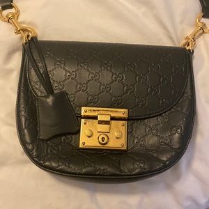 Gucci padlock cross body bag. Good condition strap needs to be ironed black